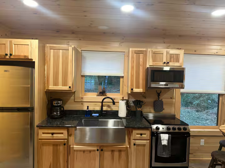 Full cabin kitchen with stainless steel appliances