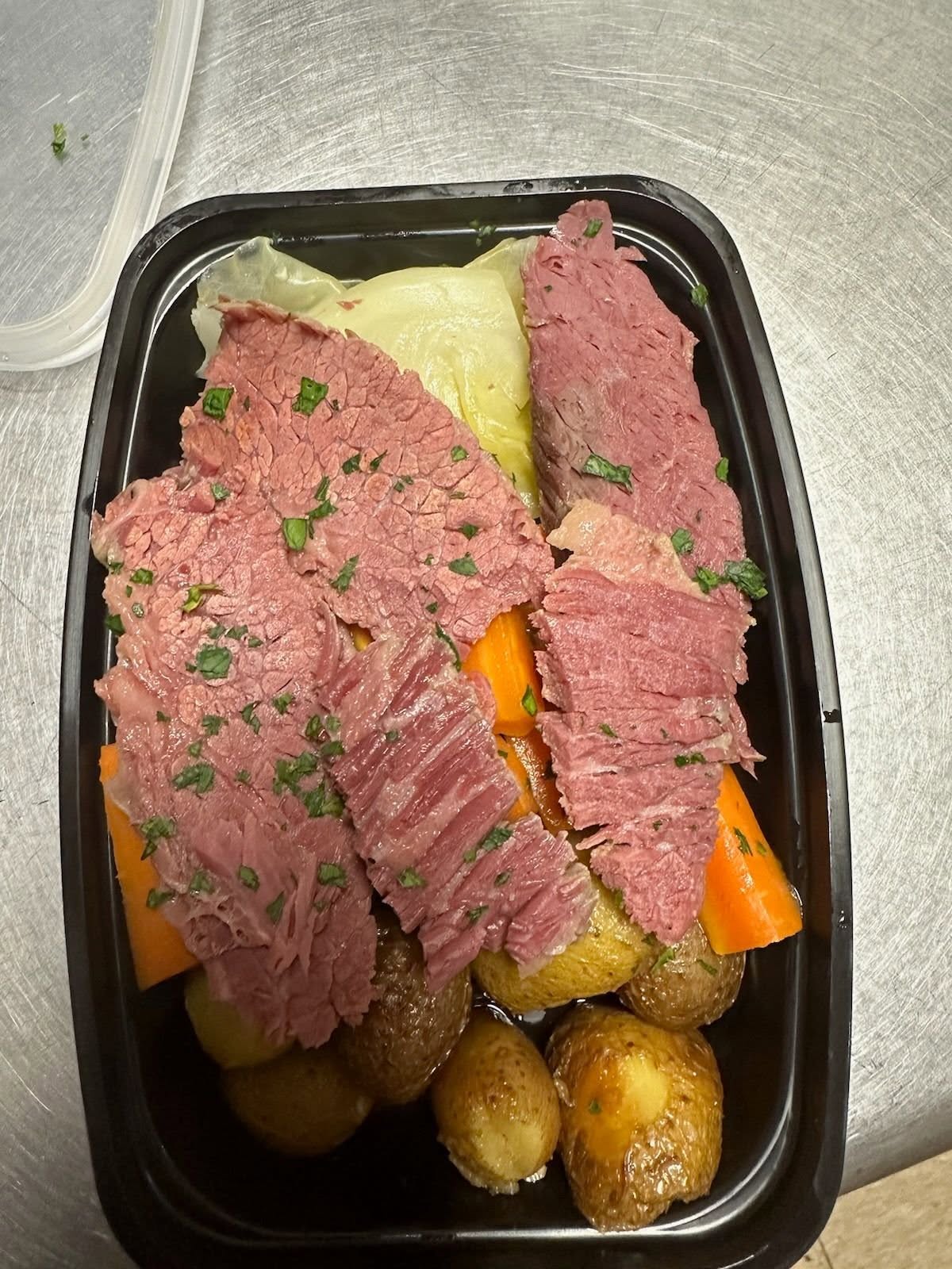 Corned beef dinner special with potatoes and vegetables